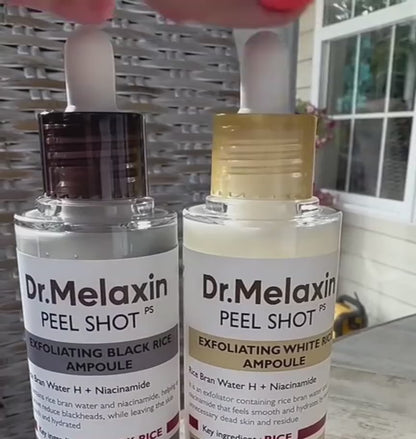 Supplier-provided presentation of the two Dr. Melaxin Peel Shot ampoules: Black Rice and White Rice. Muted product set footage.